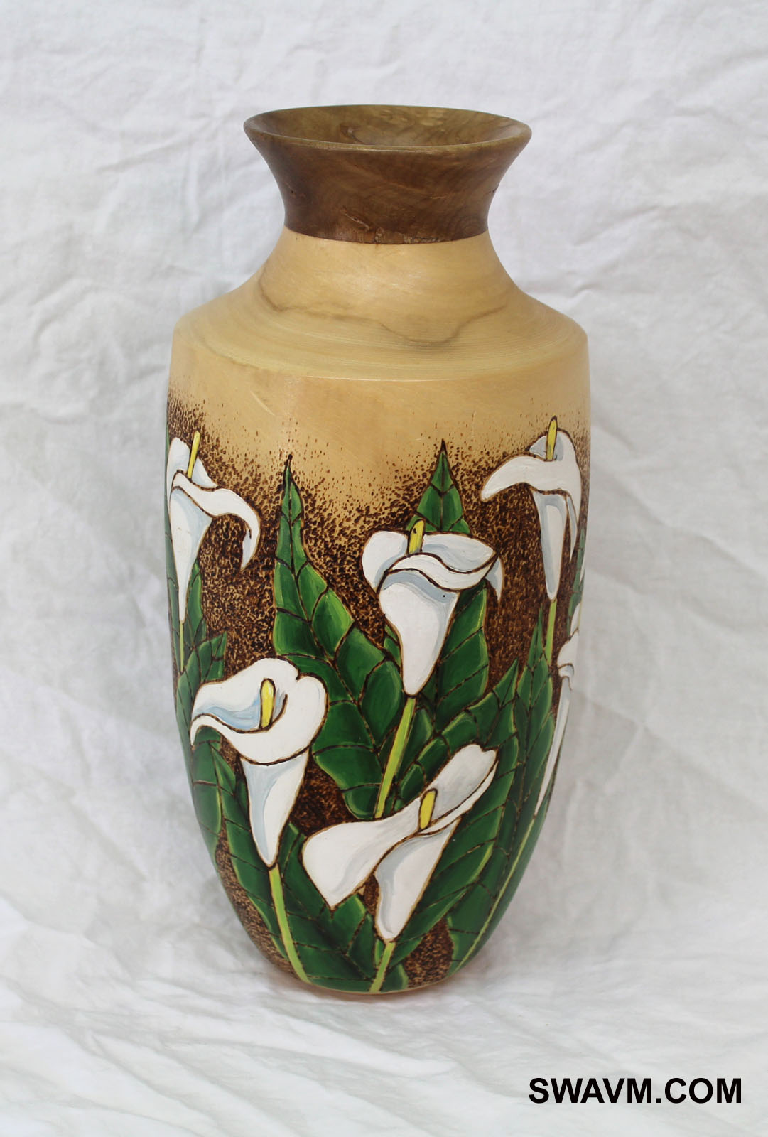Lillies done with woodburning and acrylic on hand-turned Aspen vase with Myrtle Wood lip